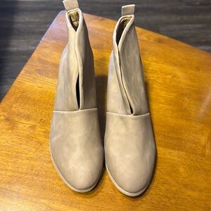 Tan heel bootie. Never worn. Size 8 but more like 7 1/2